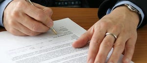 Man Signing Contract
